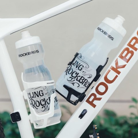 Uchwyt rowerowy z poliwęglanu na butelkę bidon śr. 51-73 mm - biały Uchwyt rowerowy z poliwęglanu na butelkę bidon śr. 51-73 mm - biały